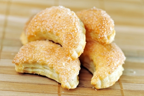 heap of tasty cookies on  bamboo napkin close up