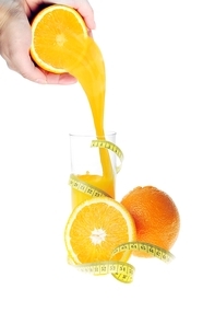 glass with fresh orange juice as diet symbol