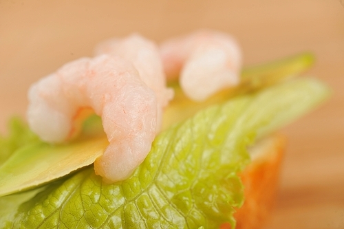 Sandwich garnish with shrimps|avokado and lettuce on  bamboo napkin|snack