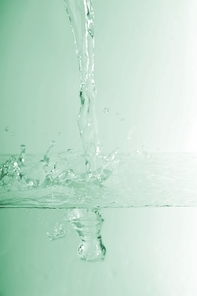 Stream and splashes of cold water  background