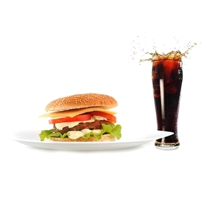 hamburger with cutlet and s on dish with fresh sparking drink