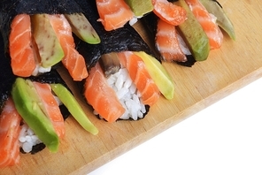 tasty fresh sushi cone on wooden plate