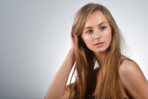 Photo of beautiful young woman with blonde hair