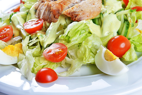 Fresh salad with lettuce|cherry  tomato and meat on dish