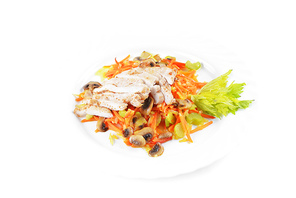 salad of grilled vegetables and meat on  plate