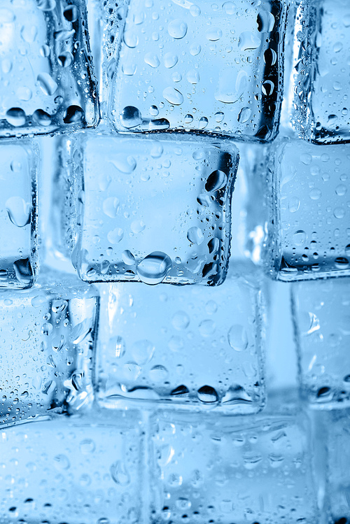 cubes of clear transparent ice close up