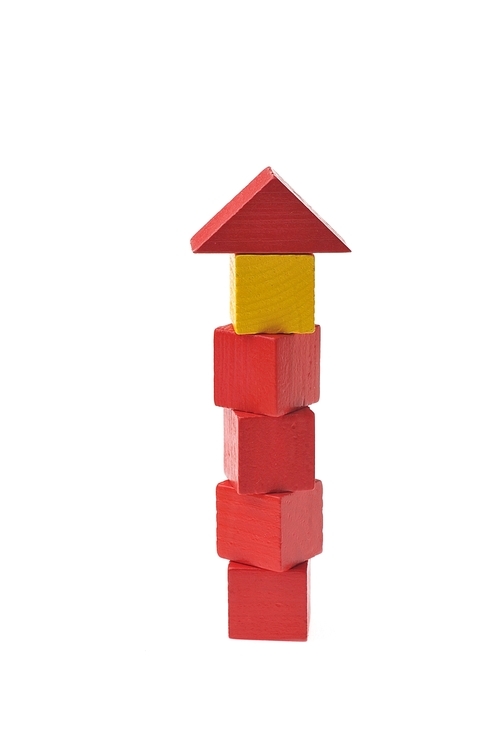 Children's wooden toy blocks isolated on white