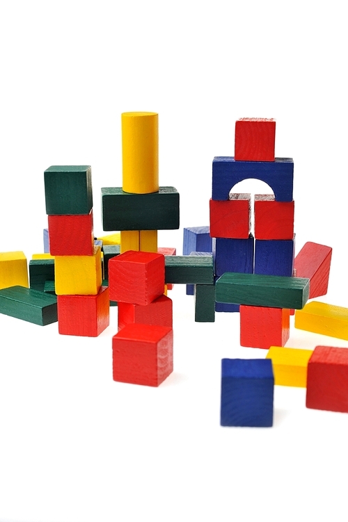 colorful wooden toy blocks isolated on white