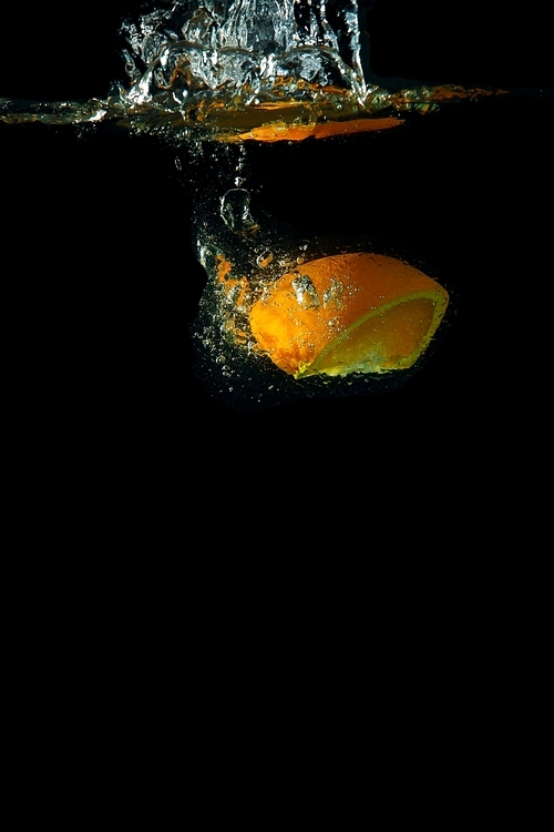 Bright and juicy lemon under water. Fresh and healthy meal