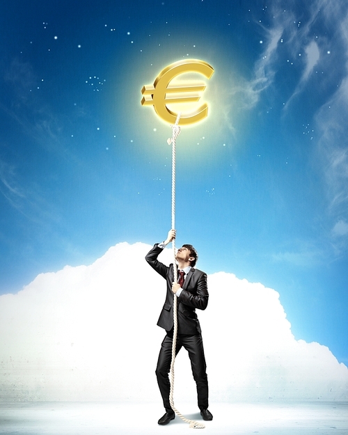 Image of businessman climbing rope attached to euro sign