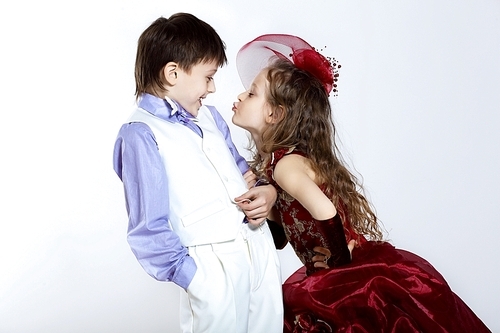 Portrait of a little boy and girl in beautiful dress