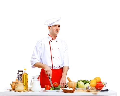 Young cook preparing food wearing a red apron