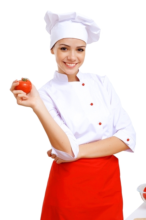 Young cook preparing food from fresh vegetables