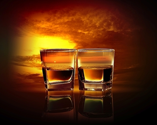 Two glasses of whiskey with sea illustration in against sky background