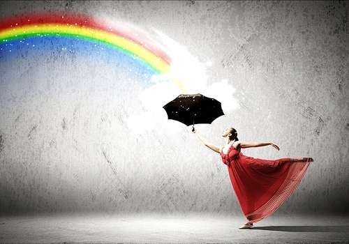 dance dancer in flying satin dress with umbrella and a