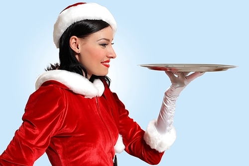 Excited Santa Girl presenting your product|lots of copy-space