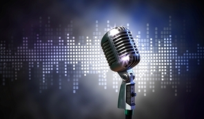 Single retro microphone against colourful background with lights