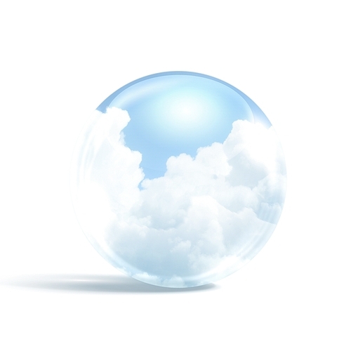 White clouds in blue sky inside a glass sphere