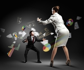 Image of businesspeople arguing and acting as sumo fighters