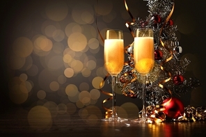 Two champagne glasses ready to bring in the New Year