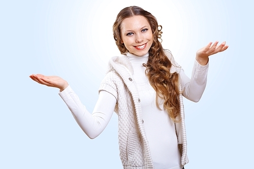 Young pretty woman with lomng hair wearing warm pullover