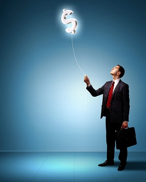 Light bulb and a business person as symbols of creativity in business