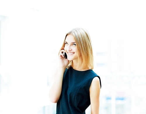 A portrait of a young business woman in an office