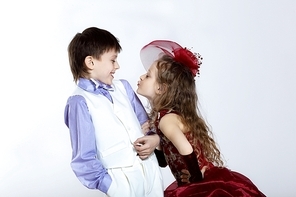 Portrait of a little boy and girl in beautiful dress