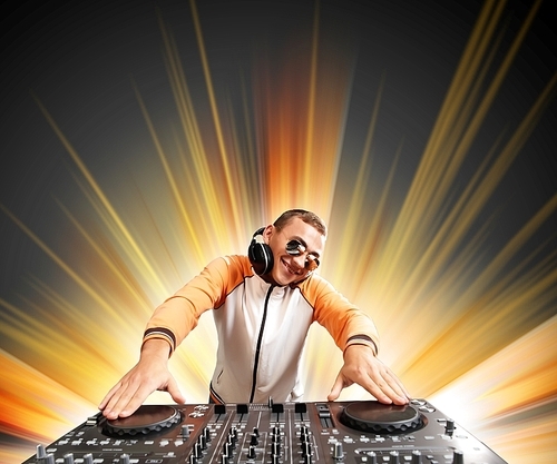 DJ with a mixer equipment to control sound and play music
