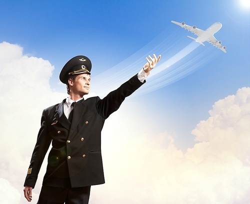 Image of pilot touching sky against airplane background