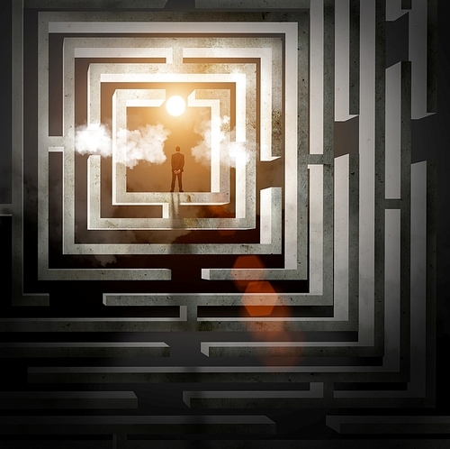 Silhouette of businessman standing in maze sun above
