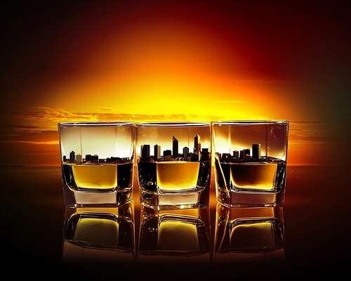 Image of three glasses of whiskey with city illustration in