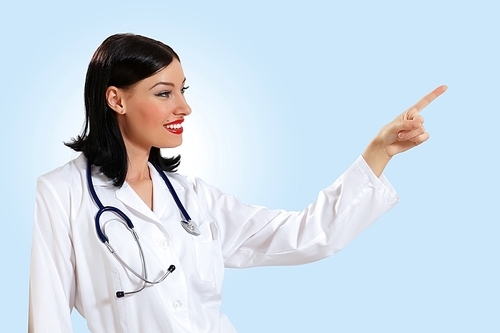 Portrait of happy successful young female doctor holding a stethoscope
