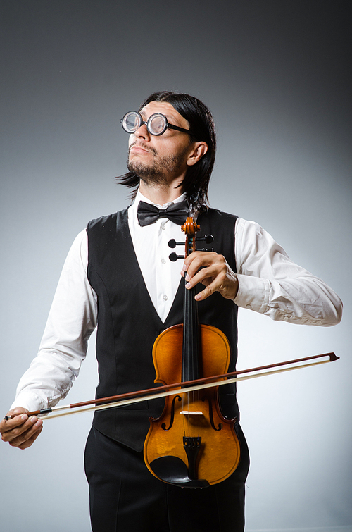 Funny fiddle violin player in musical concept