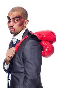 Badly beaten businessman with boxing gloves