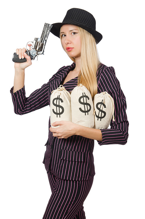 Woman gangster with gun in vintage concept