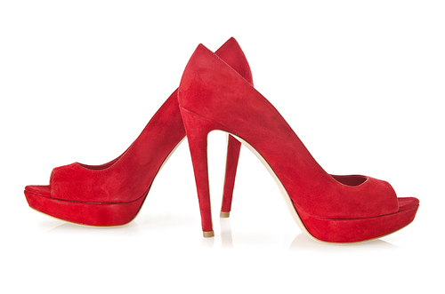 Red stylish woman shoes isolated on the white