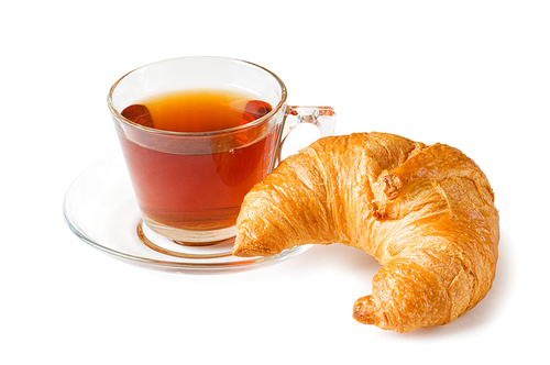 Tea and croissants on the reflective background