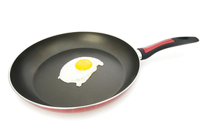Pan and fried egg isolated on the white