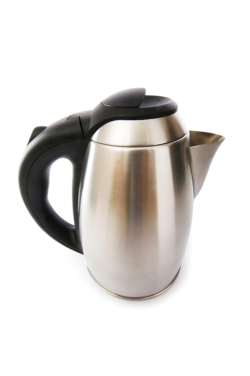 shiny kettle isolated on the white