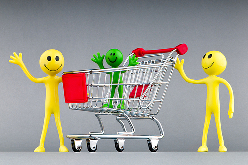 Happy family with shopping cart