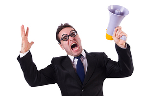 Young businessman with loudspeaker on white