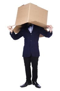 Businessman with box isolated on the white