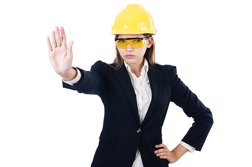 Pretty businesswoman with hard hat  isolated on white