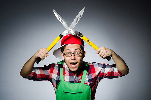 Funny man with giant shears