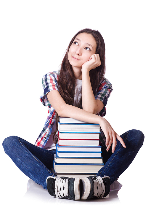 Young student with books isolated on the white