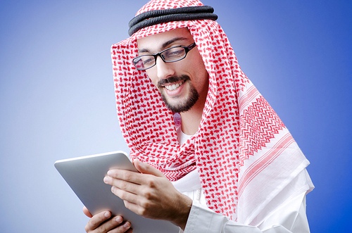 Young arab with tablet computer