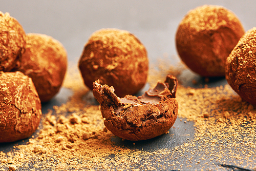 Homemade chocolate truffles on slate plate