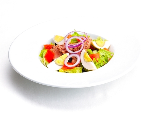 fresh organic  vegetable salad,close-up isolated on white