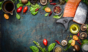 Salmon fillet with fresh ingredients for tasty cooking on rustic background, top view, banner. Healthy food concept
